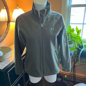 Under Armour performance fleece lined.  Olive green w/ 3 zippered pockets.  M
